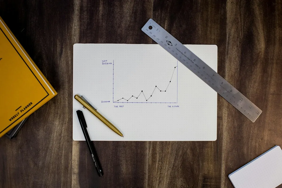 Planning documents and a technical blueprint on a desk