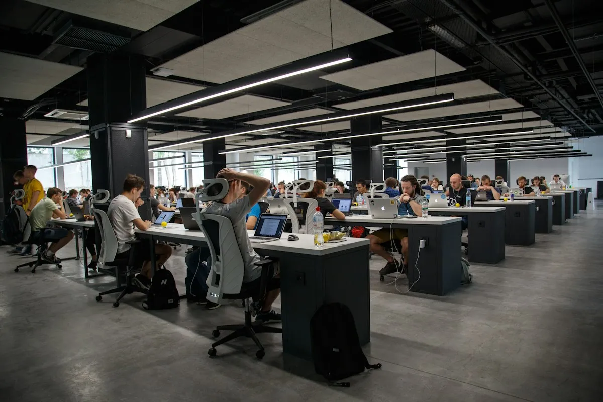 Technology team evaluating connected devices for a business workspace